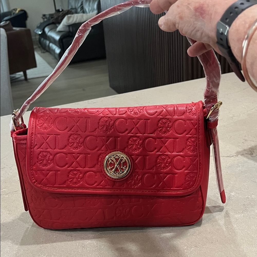 Red Embossed Shoulder Bag with Gold Emblem